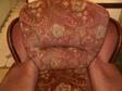 Pink patterned two seater sofa with two arm chairs. Pink....